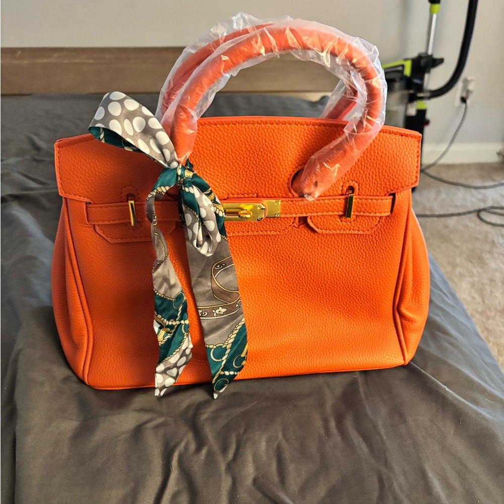 Vibrant Orange Satchel with Scarf Accent